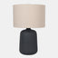  Ceramic Table Lamp with beige drum shade, and black vase-shaped base.