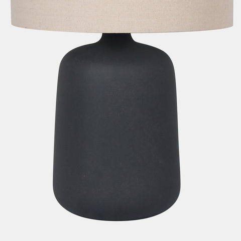  Ceramic Table Lamp with beige drum shade, and black vase-shaped base. detail of base