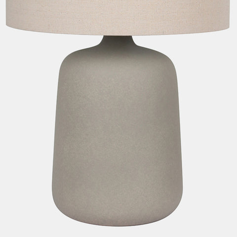  Ceramic Table Lamp with beige drum shade, and grey vase-shaped base. detail of base.