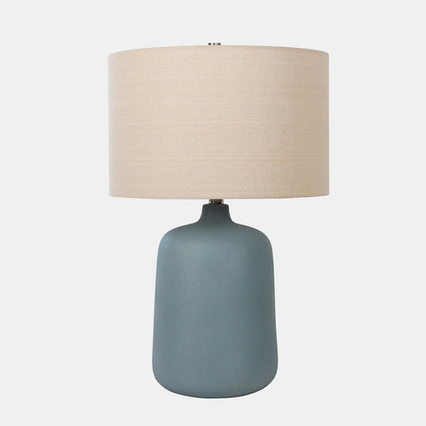  Ceramic Table Lamp with beige drum shade, and blue vase-shaped base.