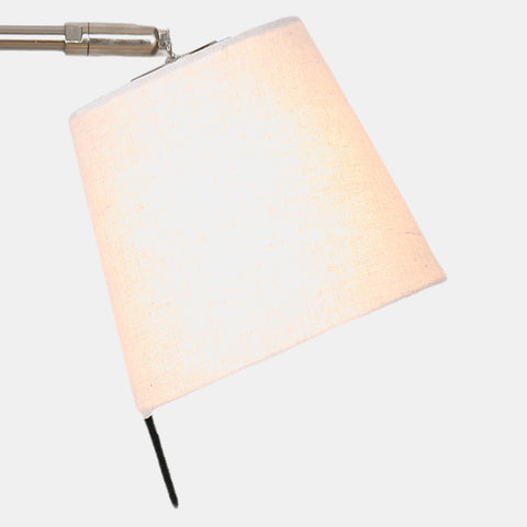 Stainless Steel arm & off-white linen shade task lamp with a black base including a USB port. Detail of shade