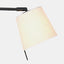 Black arm & off-white linen shade task lamp with a black base including a USB port. Detail of shade.