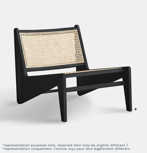 Lounge chair in black stained ash wood frame with natural rattan seat and back.