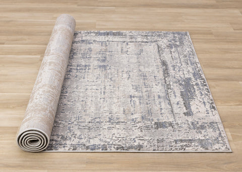 Luca Distressed Rug - Grey Blue roll on floor