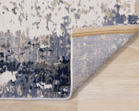 Luca Distressed Rug - Blue & Beige corner flipped to show underside