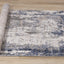 Luca Distressed Rug - Blue & Beige roll on floor