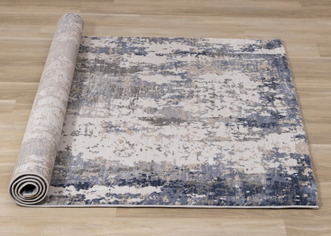 Luca Distressed Rug - Blue & Beige roll on floor