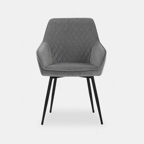 Scandinavian style dining chair in grey velvet and black metal legs.