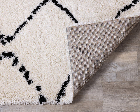  Maroq Shag Rug - Black & White Diamonds corner flipped to show underside