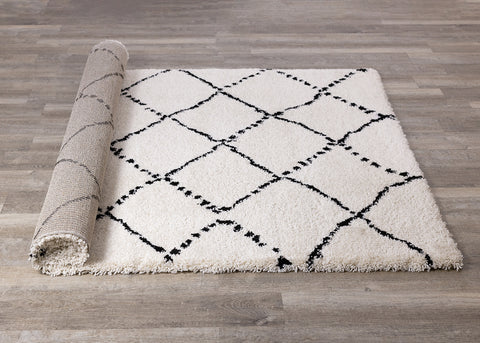  Maroq Shag Rug - Black & White Diamonds roll on floor