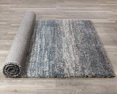 Maroq Shag Rug - Blue / Grey Stripes roll on floor