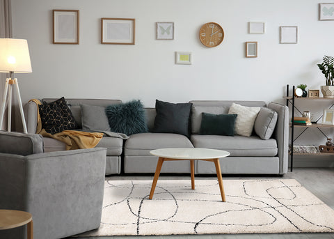 Maroq Shag Rug - Cream / Black Lines in living room setting