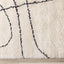 Maroq Shag Rug - Cream / Black Lines corner detail