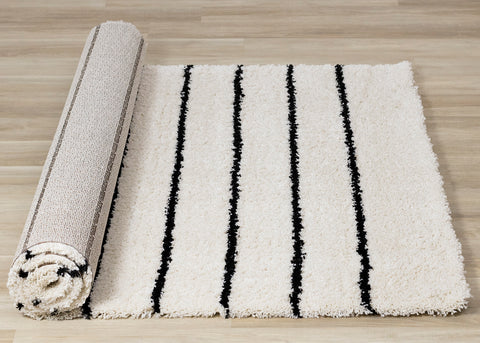 Maroq Shag Rug - Straight Lines roll on floor