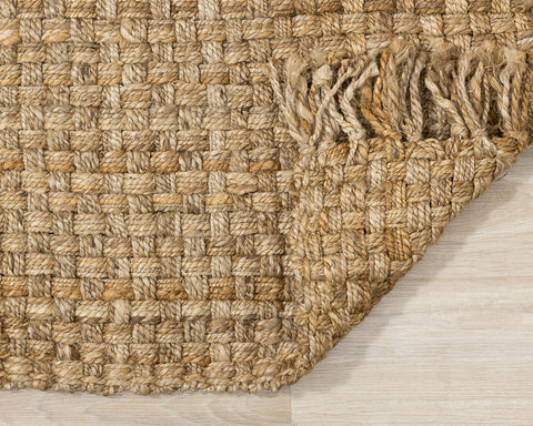 Naturals Rug - Woven Basket corner flipped to show underside