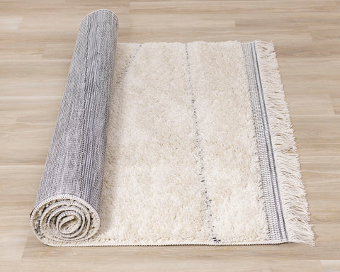 Novato Rug - Asymetric Lines Cream roll on floor