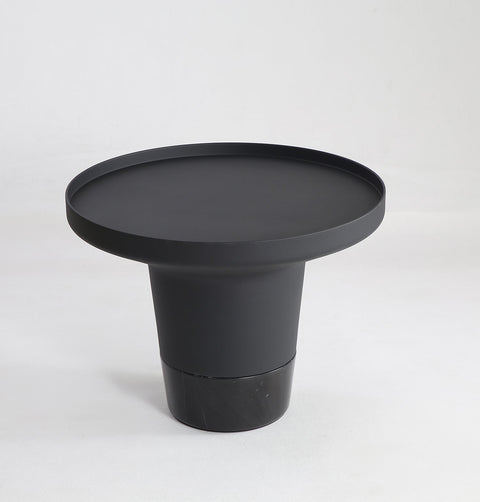 Minimal black powder coated aluminum side table resembling a pier bollard with a black marble base.