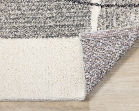 Ravine Distressed Rug - Grey Cream Modern Abstract corner flipped to show underside