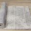 Ravine Rug - Grey Cream Distressed Lines roll on floor