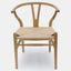Hans Wegner inspired dining chair in natural ash with natural cord woven seat.