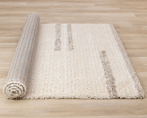 Rondo Rug - Lines roll on floor