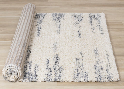 Rondo Rug - Modern Stripes roll on floor