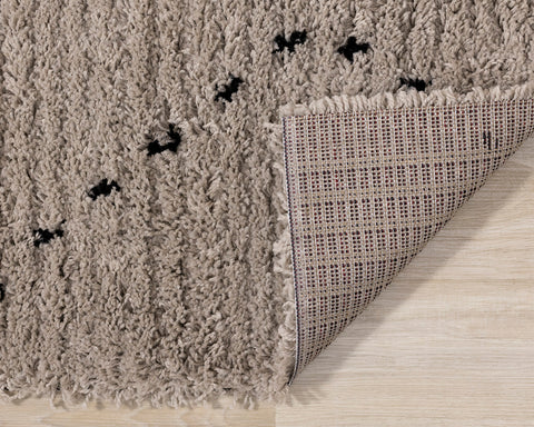 Rondo Rug - Black Diamond Stitch corner flipped to show underside