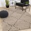 Rondo Rug - Black Diamond Stitch in living room setting