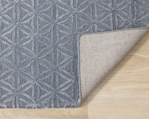 Royal Natural Wool Rug - Blue corner flipped to show underside