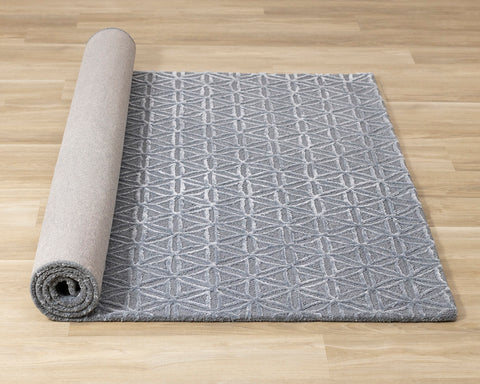 Royal Natural Wool Rug - Blue roll on floor