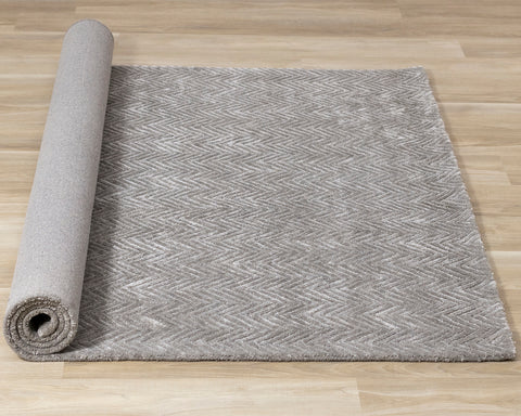 Royal Natural Wool Rug - Grey Chevron roll on floor