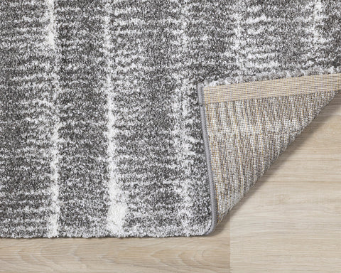 Sable Rug - Grey Scratches corner flipped to show underside