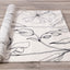 Safi Rug - Grey Flowers roll on floor