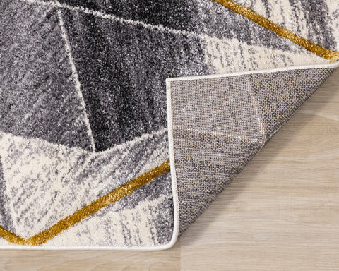 Soho Rug - Grey Yellow Diamonds corner flipped to show underside