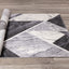 Soho Rug - Geometric Marble roll on floor