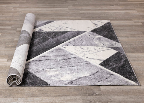 Soho Rug - Geometric Marble roll on floor