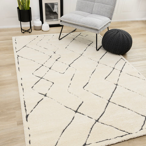 Talia Rug - White Broken Lattice in living room setting