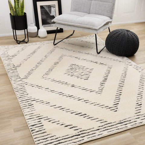 Talia Rug - Black Striped Diamond in living room setting