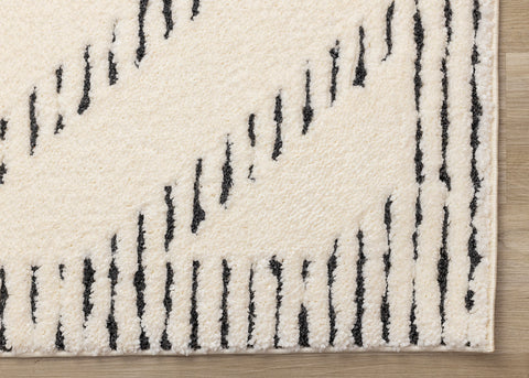 Talia Rug - Black Striped Diamond corner detail