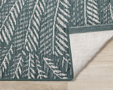 Vista Indoor / Outdoor Rug - Botanical Print corner flipped to show underside