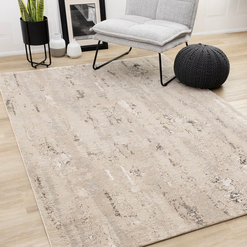 Zola Distressed Rug - Beige Cream in living room setting