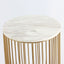 Top detail of side Table in white Carrara Marble sitting on a gold chromed stainless steel base resembling a bird-cage