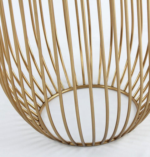 Detail of gold chromed stainless steel base resembling a bird-cage.