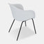 White plastic Scandinavian style dining chair with black metal legs and dark grey cushioned seat.