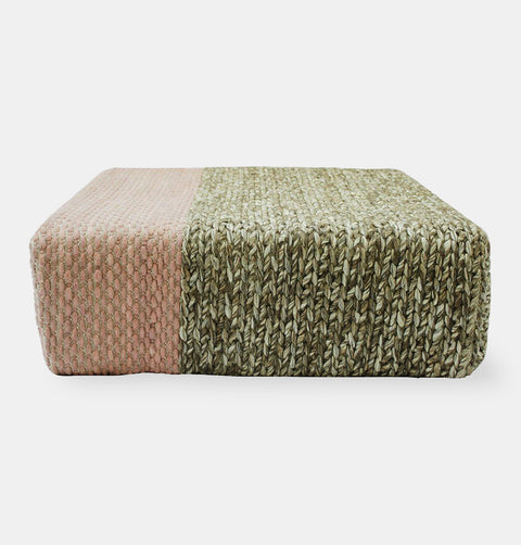 Handmade wool braided square floor pouf in natural grey with offset silver pink braiding.