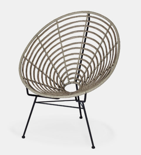 Indoor / Outdoor lounge chair featuring a round metal frame in a basket shape wrapped in synthetic wicker.