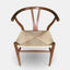Hans Wegner inspired dining chair in walnut stained ash with natural cord woven seat.