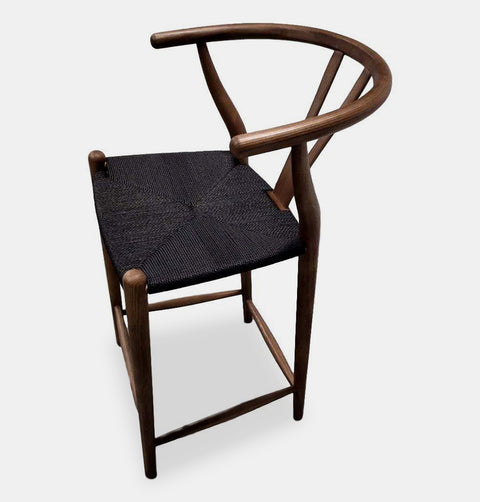 Hans Wegner inspired counter stool in walnut stained ash wood with black cord woven seat.