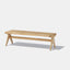 Solid natural ash wood bench with solid frame and woven natural rattan seat.