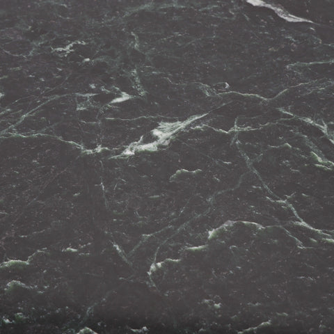 Sample detail of dark green marble used on side table.